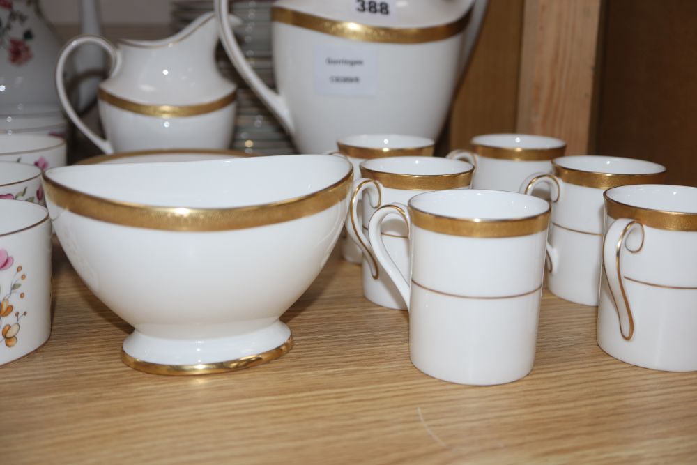 A Coalport floral tea set and a Royal Doulton Royal gold coffee set